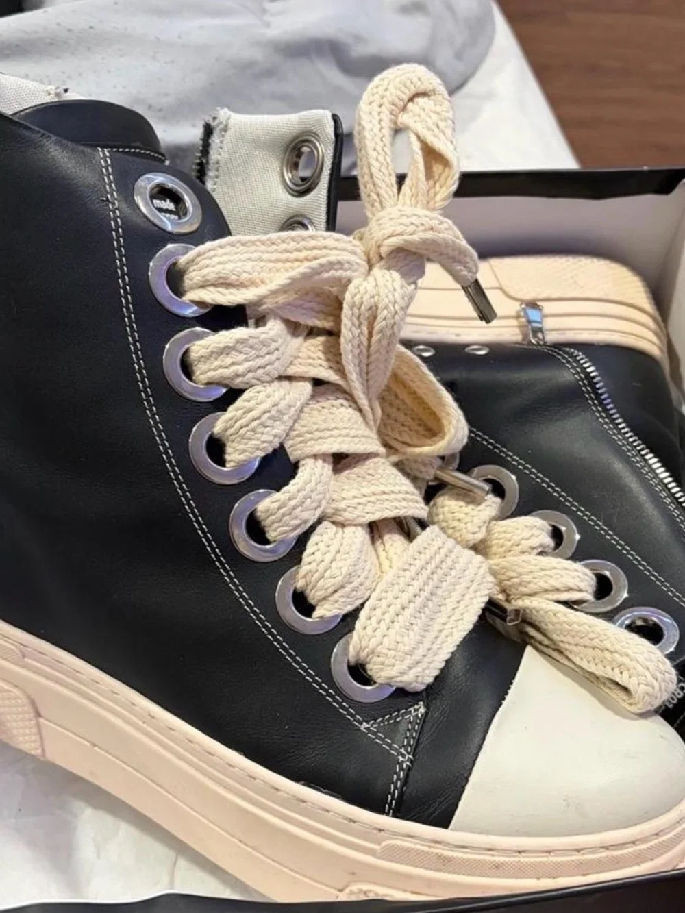 Platform High-Top Sneakers in Black and Cream